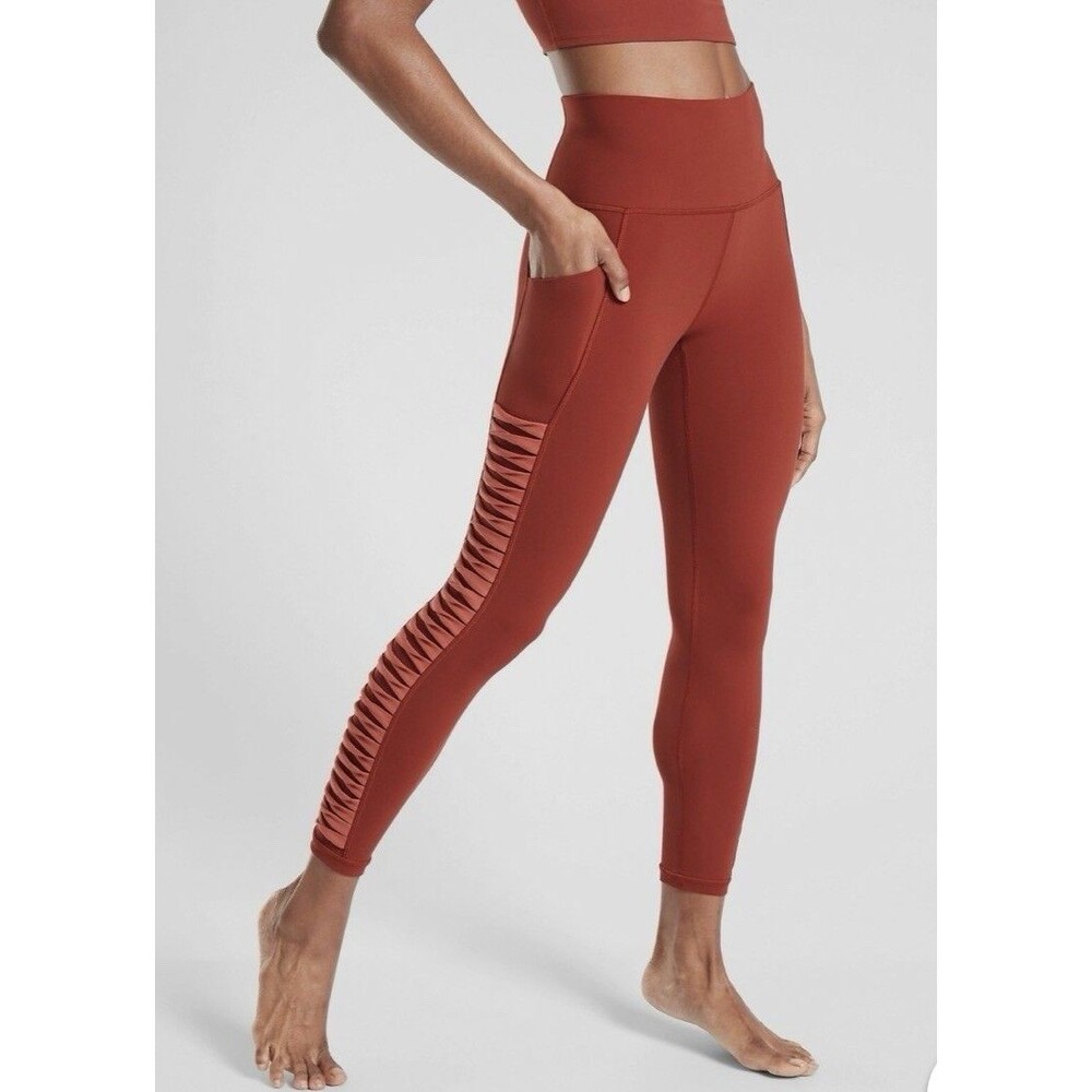 Athleta salutation Stash Pocket II Twist 7/8 Leggings Powervita Rust Red Large